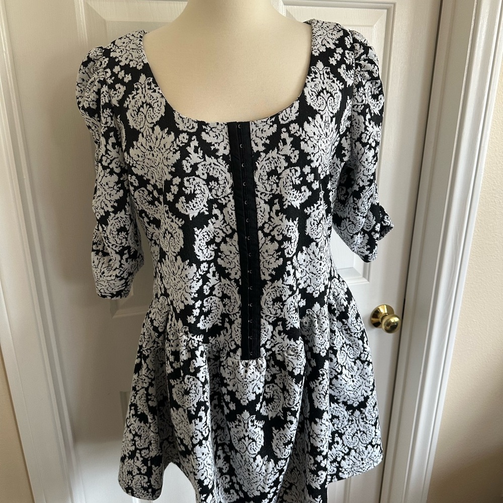 Betsey Johnson Black and White Floral Peplum Tunic